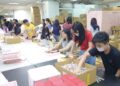 支持身心障礙者就業新北志工家庭體驗月餅包裝學習共融精神