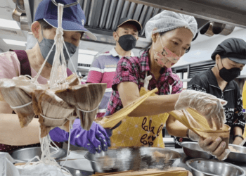 眾能創新協會攜手黎明技術學院 為泰山地區弱勢送愛心粽